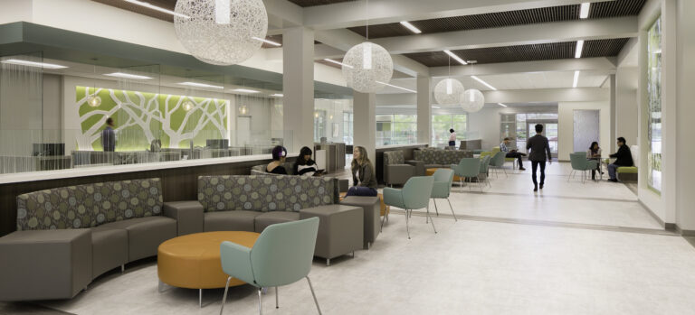 Modern hospital or office waiting area with curved seating, hanging globe lights, and people talking
